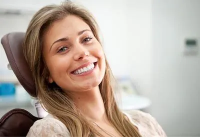 patient smiling after getting dental implants in Cherry Hill, NJ