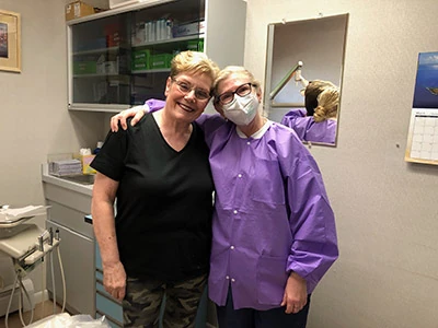 Dr. Corrie J Crowe with one of her patients