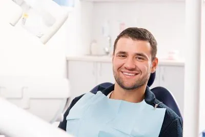 patient smiling after his restorative dentistry procedure