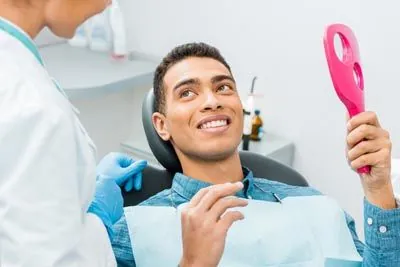 patient relieved of pain after his root canal procedure